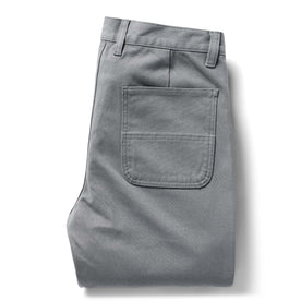 flatlay of The Camp Pant in Gravel Boss Duck, shown folded, Bottoms by Taylor Stitch