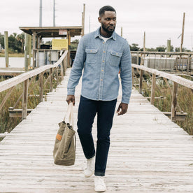 fit model walking in The Demcratic Jean in Wallace Wash Organic Selvage, Bottoms by Taylor Stitch