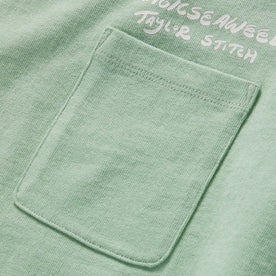 material shot of the pocket on The Heavy Bag Long Sleeve in Party Wave, Knits by Taylor Stitch