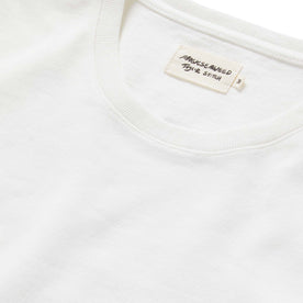 material shot of the label and neck opening on The Heavy Bag Tee in Sea Lettuce, Knits by Taylor Stitch