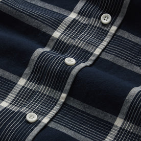 material shot of the buttons on The Jack in Midnight Plaid, Wovens by Taylor Stitch