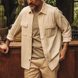 fit model standing in The Ledge Shirt in Oyster Herringbone, Wovens by Taylor Stitch