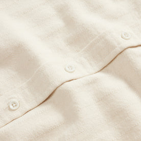 material shot of the buttons on The Ledge Shirt in Oyster Herringbone, Wovens by Taylor Stitch