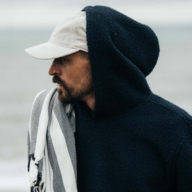 fit model showing the side of The Nomad Hoodie in Navy Sherpa, Outerwear by Taylor Stitch