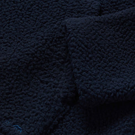 material shot of the sleeve of The Nomad Hoodie in Navy Sherpa, Outerwear by Taylor Stitch