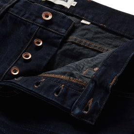 material shot of the button fly on The Slim Jean in Wallace Wash Organic Selvage, Bottoms by Taylor Stitch