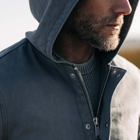 fit model wearing The Workhorse Hoodie in Gravel Boss Duck with hood up, Outerwear by Taylor Stitch