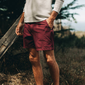 fit model wearing The Traverse Short in Wine, hand in pocket, Shorts by Taylor Stitch