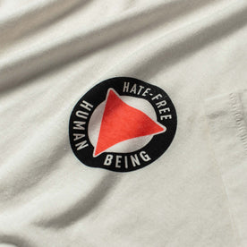 material shot of close-up of the graphic logo on The Cotton Hemp Tee in Hate-Free, Knits by Taylor Stitch