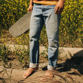 fit model standing in The Democratic Jean in Patch Wash Selvage, Bottoms by Taylor Stitch