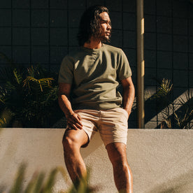 fit model sitting in The Foundation Short in Khaki Twill, Bottoms by Taylor Stitch