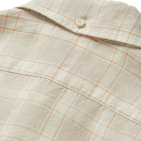 material shot of the back collar button on The Jack in Dune Plaid, Wovens by Taylor Stitch