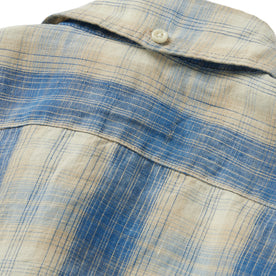 material shot of the back collar button on The Jack in Iceberg Plaid, Wovens by Taylor Stitch