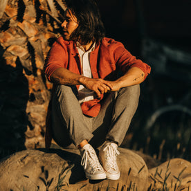 fit model sitting in The Ojai Jacket in Rust Hemp, Outerwear by Taylor Stitch