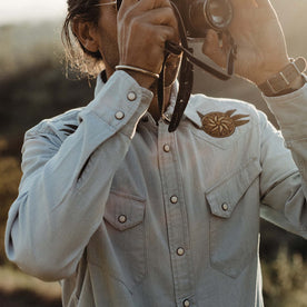 fit model taking a photo in The Embroidered Western Shirt in Washed Selvage, Wovens by Taylor Stitch