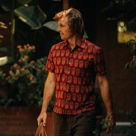 fit model walking in The Short Sleeve Hawthorne in Rust Floral, Wovens by Taylor Stitch