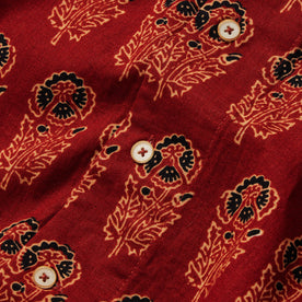 material shot of the buttons on The Short Sleeve Hawthorne in Rust Floral, Wovens by Taylor Stitch