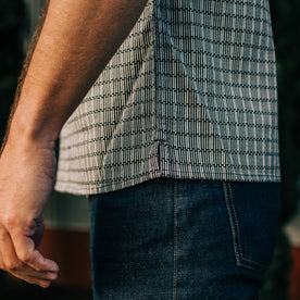 fit model standing in The Short Sleeve Hawthorne in Navy Stripe, Wovens by Taylor Stitch