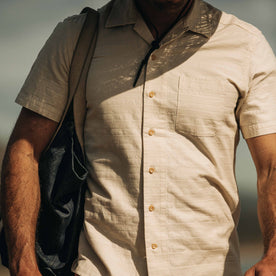 fit model wearing The Short Sleeve Hawthorne in Sand buttoned, Wovens by Taylor Stitch