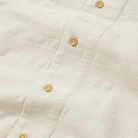 material shot of the buttons on The Short Sleeve Hawthorne in Sand, Wovens by Taylor Stitch