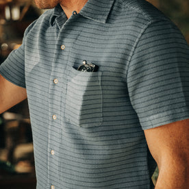 fit model showing the texture on The Short Sleeve Hawthorne in Ocean Pickstitch Waffle, Wovens by Taylor Stitch