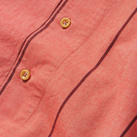 material shot of the buttons on The Short Sleeve Hawthorne in Rust Stripe , Wovens by Taylor Stitch