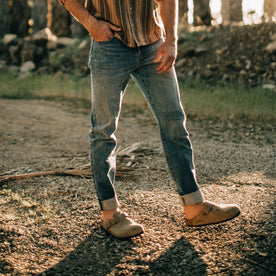 fit model walking in The Slim Jean in Patch Wash Selvage, Bottoms by Taylor Stitch