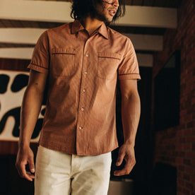 fit model standing in The Tulum in Rust Stripe, Wovens by Taylor Stitch