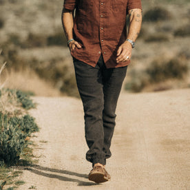 fit model walking in the desert in The Apres Pant in Shadow Hemp, Bottoms by Taylor Stitch