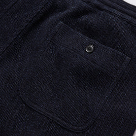 material shot of the rear pocket of The Apres Short in Indigo Waffle, Bottoms by Taylor Stitch