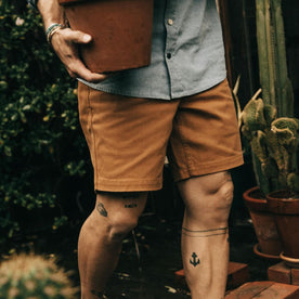 fit model walking in The Camp Short in Cedar Boss Duck, Bottoms by Taylor Stitch