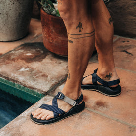 fit model wearing The Z/1 Classic USA in Navy Waffle by the pool, Footwear by Taylor Stitch