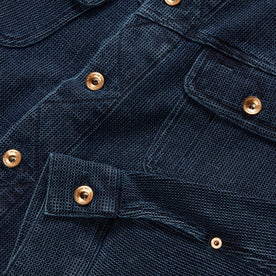 material shot of the YKK hardware on The Long Haul Jacket in Indigo Waffle, Outerwear by Taylor Stitch