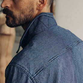 fit model showing the back of The Long Haul Jacket in Washed Indigo Stripe, Outerwear by Taylor Stitch