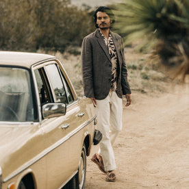 fit model walking by a vintage mercedes in The Sheffield Sport Coat in Cocoa Linen, Outerwear by Taylor Stitch