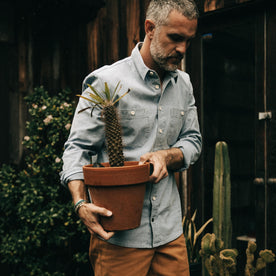 fit model walking in The Utility Shirt in Washed Indigo Boss Duck, Wovens by Taylor Stitch