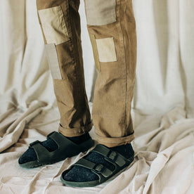 material shot of The Atelier and Repairs Chino in British Khaki, model wearing chinos with birks, Bottoms by Taylor Stitch