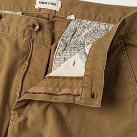 material shot of The Atelier and Repairs Chino in British Khaki, fly shot, Bottoms by Taylor Stitch