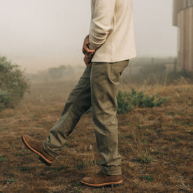 fit model wearing The Camp Pant in Stone Boss Duck, hands in pockets, Bottoms by Taylor Stitch