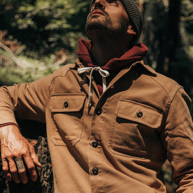 fit model wearing The Shop Shirt in Tobacco Boss Duck, looking up, Wovens by Taylor Stitch