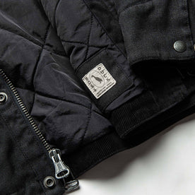 material shot of boss duck logo, Outerwear by Taylor Stitch