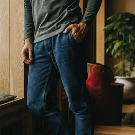 fit model with his hand in his pocket of The Apres Pant in Indigo Cross Dye, Bottoms by Taylor Stitch