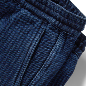 material shot of the pocket on The Apres Pant in Indigo Cross Dye, Bottoms by Taylor Stitch