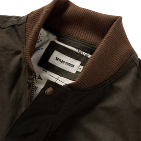 material shot of the ribbed collar on The Bomber Jacket in Bark EverWax, Outerwear by Taylor Stitch