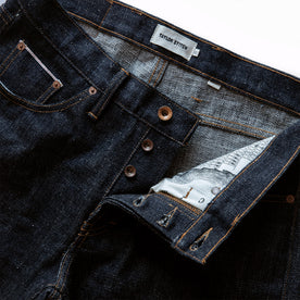 material shot of button fly on The Democratic Jean in Umeda Selvage, Bottoms by Taylor Stitch