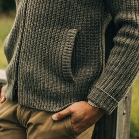 fit model showing pocket detail on The Fisherman Full-Zip in Taupe, Knits by Taylor Stitch