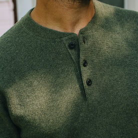 fit model showing button detail on The Hudson Sweater in Heather Green, Knits by Taylor Stitch