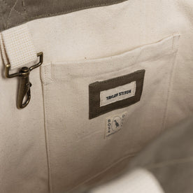 material shot of the internal pocket in The Market Tote in Stone Boss Duck, Accessories by Taylor Stitch