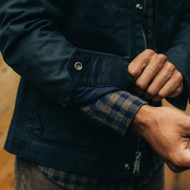 fit model showing corduroy detail on The Pathfinder Jacket in Navy Dry Wax, Outerwear by Taylor Stitch