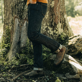 fit model walking in The Slim Jean in Umeda Selvage, Bottoms by Taylor Stitch